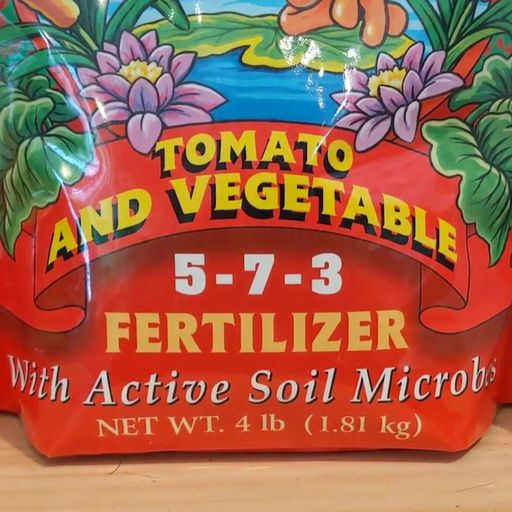 Fertilizing lawns and gardens cover art